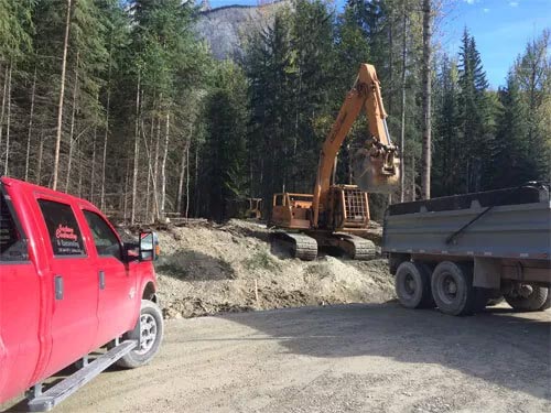 Road Building Services at Brian Jackson Contracting Logo - Golden, BC
